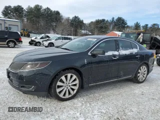 2014 Lincoln MKS EcoBoost z VIN 1LNHL9FT9EG600896, wystawiony jako Copart lot #41825555 z przebiegiem 114 603 mil mil oraz Czysty tytuł • Clean title. Historia ofert i sprzedaży dostępna na DreamBid. Obrazek 1.