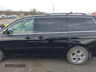 2010 Honda Odyssey Touring with VIN 5FNRL3H95AB040354, listed as a IAAI auction lot 41889501 with 155,069 mi miles. Bid and sale history available at carsss.com. Image 6.