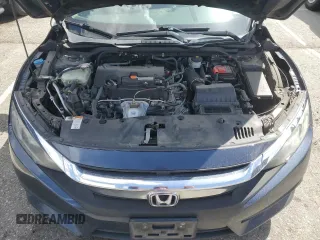 2018 Honda Civic EX с VIN 2HGFC2F72JH600406, выставлен на аукционе Copart как лот 52011455 с пробегом 155 666 миль миль и Списание • Salvage title. История ставок и продаж доступна на DreamBid. Изображение 11.