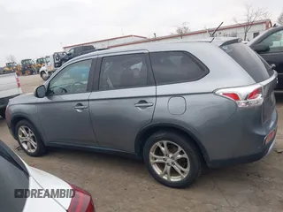 2015 Mitsubishi Outlander SE with VIN JA4AZ3A39FZ007936, listed as a IAAI auction lot 41003206 with 136,017 mi miles and . Bid and sale history available at DreamBid. Image 14.