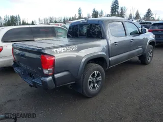 2016 Toyota Tacoma SR with VIN 5TFCZ5AN3GX010520, listed as a IAAI auction lot 41699080 with 65,877 mi miles. Bid and sale history available at carsss.com. Image 4.