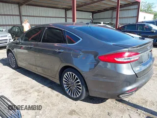 2017 Ford Fusion Titanium with VIN 3FA6P0K98HR124035, listed as a IAAI auction lot 42307936 with Not provided miles and . Bid and sale history available at DreamBid. Image 3.