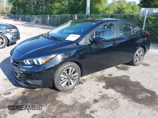 2023 Nissan Versa SV with VIN 3N1CN8EV6PL816776, listed as a IAAI auction lot 42284707 with 66,930 mi miles and . Bid and sale history available at DreamBid. Image 2.