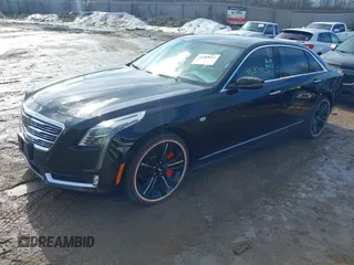 2017 Cadillac CT6 Platinum AWD z VIN 1G6KN5R64HU175275, wystawiony jako IAAI lot #41683802 z przebiegiem 75 604 mil mil oraz . Historia ofert i sprzedaży dostępna na DreamBid. Obrazek 17.