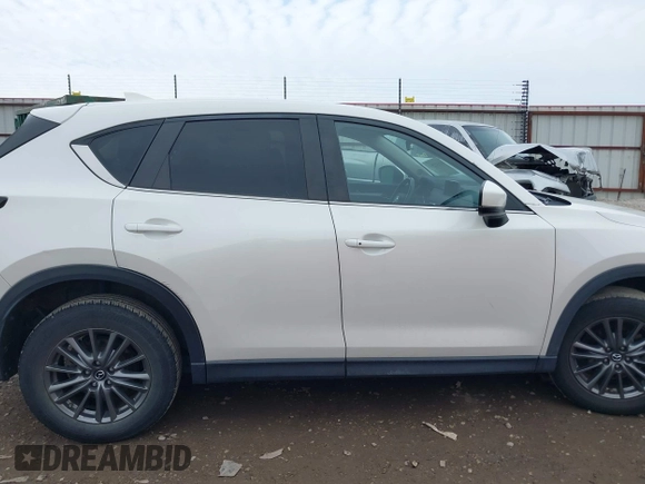 2020 Mazda CX-5 Touring with VIN JM3KFBCM6L0764982, listed as a IAAI auction lot 41632293 with 96,042 mi miles. Bid and sale history available at carsss.com. Image 14.