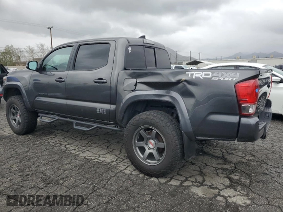 2016 Toyota Tacoma SR with VIN 3TMCZ5AN6GM018536, listed as a Copart auction lot 49336645 with 103,298 mi miles and Salvage Title. Bid and sale history available at carsss.com. Image 2.