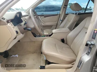 2002 Mercedes-Benz E-Class with VIN WDBJF65J82B397776, listed as a Copart auction lot 73745144 with 0 mi miles and Salvage Title. Bid and sale history available at carsss.com. Image 7.