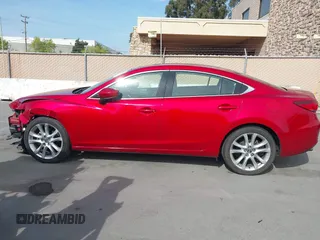 2017 Mazda Mazda6 Touring with VIN JM1GL1V56H1155982, listed as a IAAI auction lot 42055447 with 59,566 mi miles. Bid and sale history available at carsss.com. Image 15.