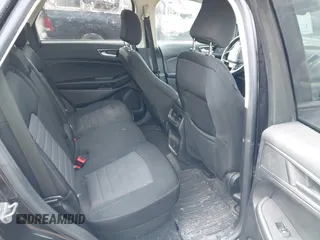 2021 Ford Edge SE z VIN 2FMPK4G9XMBA15819, wystawiony jako IAAI lot #41921371 z przebiegiem 63 373 mil mil oraz . Historia ofert i sprzedaży dostępna na DreamBid. Obrazek 8.