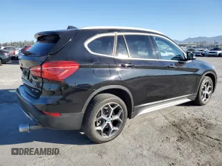 2021 BMW X1 sDrive28i with VIN WBXJG7C03M5T10112, listed as a Copart auction lot 49386695 with 46,869 mi miles and Salvage Title. Bid and sale history available at DreamBid. Image 3.