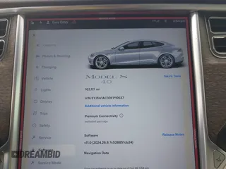 2013 Tesla Model S with VIN 5YJSA1AC3DFP10537, listed as a IAAI auction lot 40707549 with 103,111 mi miles and . Bid and sale history available at DreamBid. Image 7.
