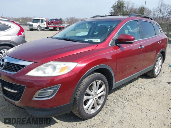 2012 Mazda CX-9 Grand Touring z VIN JM3TB3DV0C0340646, wystawiony jako IAAI lot #41854513 z przebiegiem 179 180 mil mil oraz . Historia ofert i sprzedaży dostępna na DreamBid. Obrazek 2.