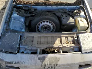 1989 Toyota MR2 z VIN JT2AW15C0K0146356, wystawiony jako Copart lot #76256644 z przebiegiem 294 380 mil mil oraz Tytuł czysty. Historia ofert i sprzedaży dostępna na DreamBid. Obrazek 11.