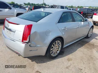 2012 Cadillac CTS Performance z VIN 1G6DJ5E37C0145221, wystawiony jako IAAI lot #42111935 z przebiegiem 82 103 mil mil oraz . Historia ofert i sprzedaży dostępna na DreamBid. Obrazek 4.
