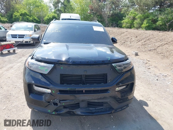 2023 Ford Explorer ST z VIN 1FM5K8GC7PGA12321, wystawiony jako IAAI lot #42125721 z przebiegiem 27 856 mil mil oraz . Historia ofert i sprzedaży dostępna na DreamBid. Obrazek 12.