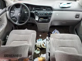 2002 Honda Odyssey LX z VIN 2HKRL18552H555312, wystawiony jako Copart lot #51844745 z przebiegiem Nie podano mil oraz Szkody całkowita. Historia ofert i sprzedaży dostępna na DreamBid. Obrazek 8.