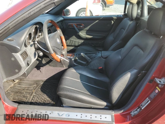 2002 Mercedes-Benz SLK 320 z VIN WDBKK65F52F245314, wystawiony jako Copart lot #42694015 z przebiegiem 114 998 mil mil oraz Szkoda całkowita • Salvage title. Historia ofert i sprzedaży dostępna na DreamBid. Obrazek 7.