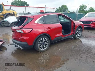 2020 Ford Escape Titanium with VIN 1FMCU9J9XLUA99423, listed as a IAAI auction lot 42511937 with 17,849 mi miles and . Bid and sale history available at DreamBid. Image 4.