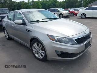 2013 Kia Optima LX z VIN 5XXGM4A79DG115514, wystawiony jako IAAI lot #42283247 z przebiegiem 173 554 mil mil oraz . Historia ofert i sprzedaży dostępna na DreamBid. Obrazek 1.