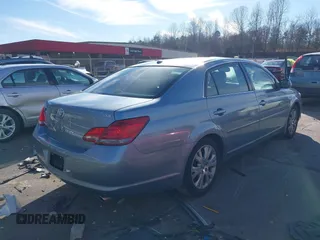 2009 Toyota Avalon XL with VIN 4T1BK36B19U350297, listed as a IAAI auction lot 41589714 with 141,003 mi miles. Bid and sale history available at carsss.com. Image 4.