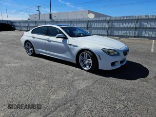 2014 BMW 6 Series 640i z VIN WBA6A0C53ED317332, wystawiony jako Copart lot #79974684 z przebiegiem 83 681 mil mil oraz Czysty tytuł • Clean title. Historia ofert i sprzedaży dostępna na DreamBid. Obrazek 1.