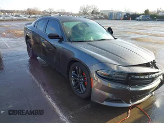 2019 Dodge Charger SXT with VIN 2C3CDXJG1KH743324, listed as a IAAI auction lot 41530661 with 113,183 mi miles and . Bid and sale history available at DreamBid. Image 1.