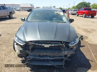 2016 Ford Fusion Titanium with VIN 3FA6P0K98GR158877, listed as a IAAI auction lot 41994013 with 57,027 mi miles and . Bid and sale history available at DreamBid. Image 13.