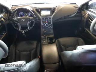 2016 Hyundai Azera Limited z VIN KMHFH4JG0GA529633, wystawiony jako Copart lot #55610065 z przebiegiem 130 827 mil mil oraz Tytuł czysty. Historia ofert i sprzedaży dostępna na DreamBid. Obrazek 8.