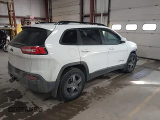 2014 Jeep Cherokee Latitude with VIN 1C4PJMCS5EW288909, listed as a IAAI auction lot 41531117 with 108,971 mi miles and . Bid and sale history available at carsss.com. Image 4.