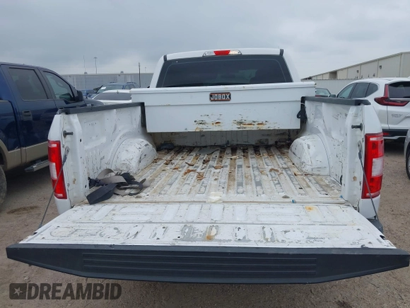 2018 Ford F-150 XL with VIN 1FTFW1E58JKE22834, listed as a IAAI auction lot 41923960 with 214,459 mi miles. Bid and sale history available at carsss.com. Image 19.
