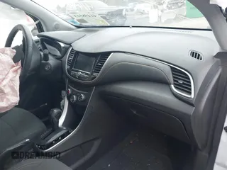 2020 Chevrolet Trax LS with VIN KL7CJKSB3LB049512, listed as a IAAI auction lot 41498513 with 56,649 mi miles and . Bid and sale history available at DreamBid. Image 5.