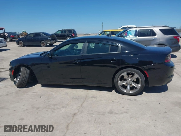 2018 Dodge Charger R/T with VIN 2C3CDXCT9JH128853, listed as a IAAI auction lot 41771706 with 54,962 mi miles and . Bid and sale history available at carsss.com. Image 14.