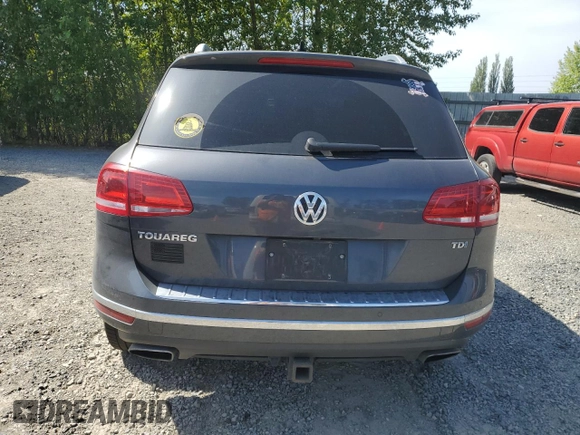 2015 Volkswagen Touareg Lux с VIN WVGEP9BP0FD006992, выставлен на аукционе Copart как лот 59524445 с пробегом 169 822 миль миль и Списание • Salvage title. История ставок и продаж доступна на DreamBid. Изображение 6.