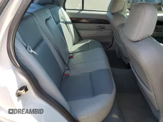 2005 Mercury Grand Marquis GS with VIN 2MEFM74W55X654070, listed as a Copart auction lot 53114785 with 56,128 mi miles and Salvage Title. Bid and sale history available at DreamBid. Image 10.