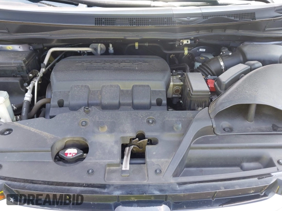 2014 Honda Odyssey EX-L with VIN 5FNRL5H63EB073585, listed as a IAAI auction lot 42673004 with 119,971 mi miles and . Bid and sale history available at DreamBid. Image 10.