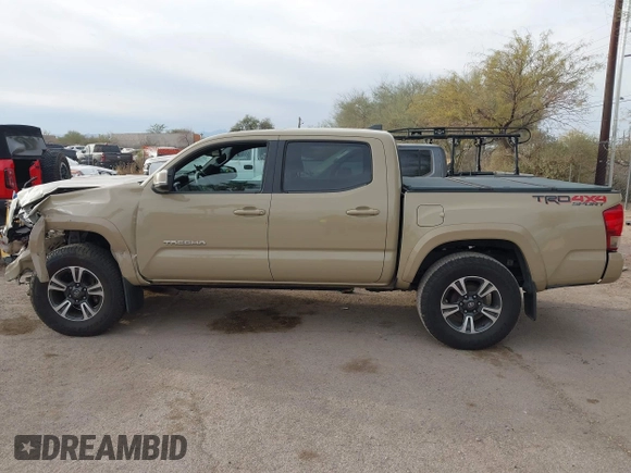 2017 Toyota Tacoma SR5 with VIN 3TMCZ5AN2HM063328, listed as a IAAI auction lot 41541775 with 137,610 mi miles and . Bid and sale history available at DreamBid. Image 15.