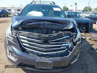 2018 Cadillac XT5 FWD with VIN 1GYKNARS7JZ206816, listed as a IAAI auction lot 42235546 with 94,125 mi miles and . Bid and sale history available at DreamBid. Image 12.