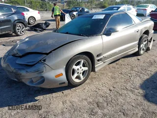 2000 Pontiac Firebird with VIN 2G2FS22K0Y2112410, listed as a IAAI auction lot 41676541 with 129,857 mi miles. Bid and sale history available at carsss.com. Image 2.