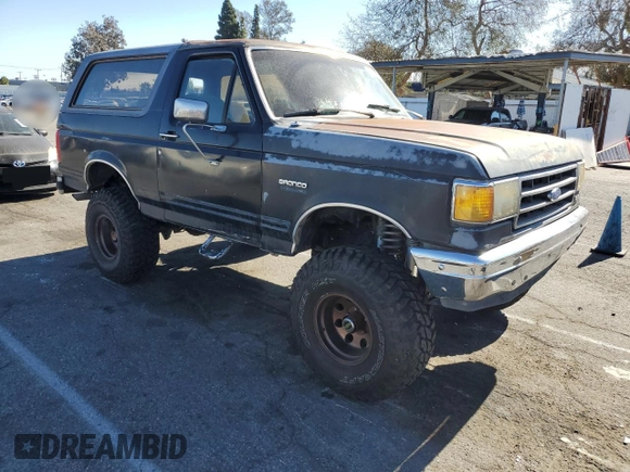 1989 Ford Bronco Custom with VIN 1FMEU15H1KLA71087, listed as a Copart auction lot 89330975 with 98,096 mi miles and Salvage Title. Bid and sale history available at DreamBid. Image 4.