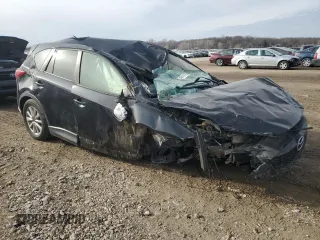 2015 Mazda CX-5 Touring with VIN JM3KE4CY4F0434425, listed as a Copart auction lot 48111255 with Not Provided miles and Salvage Title. Bid and sale history available at DreamBid. Image 4.