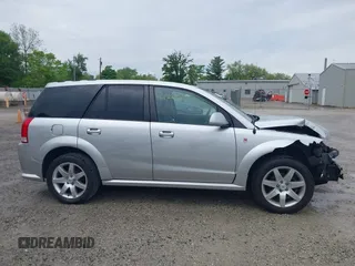 2005 Saturn VUE z VIN 5GZCZ63465S865750, wystawiony jako IAAI lot #42236645 z przebiegiem 154 052 mil mil oraz . Historia ofert i sprzedaży dostępna na DreamBid. Obrazek 13.