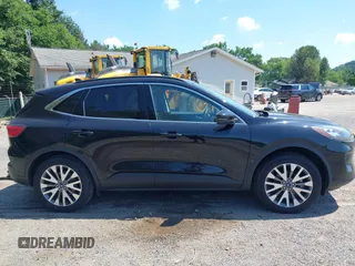 2020 Ford Escape Titanium with VIN 1FMCU9J92LUA27373, listed as a IAAI auction lot 42650077 with 42,179 mi miles and . Bid and sale history available at DreamBid. Image 14.