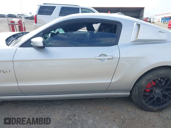 2013 Ford Mustang GT with VIN 1ZVBP8CFXD5233165, listed as a IAAI auction lot 41913971 with 181,914 mi miles. Bid and sale history available at carsss.com. Image 14.