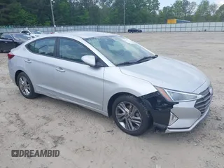 2019 Hyundai Elantra SEL z VIN KMHD84LF6KU746655, wystawiony jako IAAI lot #42135528 z przebiegiem 103 410 mil mil oraz . Historia ofert i sprzedaży dostępna na DreamBid. Obrazek 1.