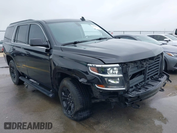 2020 Chevrolet Tahoe LS with VIN 1GNSCAKC5LR275173, listed as a IAAI auction lot 41931311 with 86,780 mi miles and . Bid and sale history available at DreamBid. Image 1.