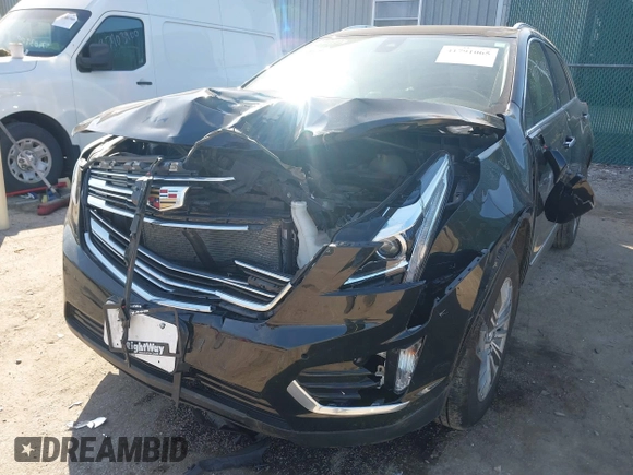 2018 Cadillac XT5 Luxury FWD with VIN 1GYKNCRS1JZ232579, listed as a IAAI auction lot 41791065 with 82,686 mi miles and . Bid and sale history available at DreamBid. Image 6.