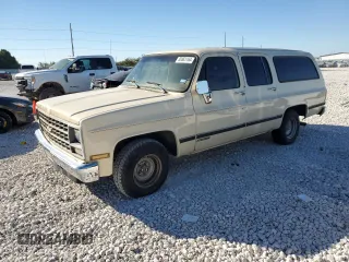 1990 Chevrolet Suburban with VIN 1GNER16K0LF169745, listed as a Copart auction lot 80865164 with 63,954 mi miles and Clean Title. Bid and sale history available at carsss.com. Image 1.