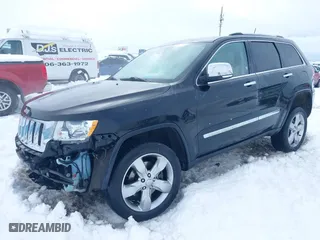 2011 Jeep Grand Cherokee Overland with VIN 1J4RR6GT5BC604784, listed as a IAAI auction lot 41515626 with 66,654 mi miles. Bid and sale history available at carsss.com. Image 18.