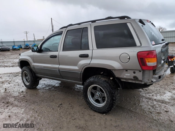 1999 Jeep Grand Cherokee Laredo with VIN 1J4GW58SXXC553547, listed as a Copart auction lot 50786405 with 151,968 mi miles and Salvage Title. Bid and sale history available at carsss.com. Image 2.