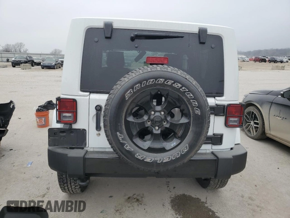 2015 Jeep Wrangler Altitude z VIN 1C4GJWBG8FL730965, wystawiony jako Copart lot #86276064 z przebiegiem 43 541 mil mil oraz Szkoda całkowita • Salvage title. Historia ofert i sprzedaży dostępna na DreamBid. Obrazek 6.